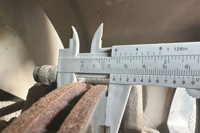 example of how to measure the thickness of the rotor and check if you need to replace it