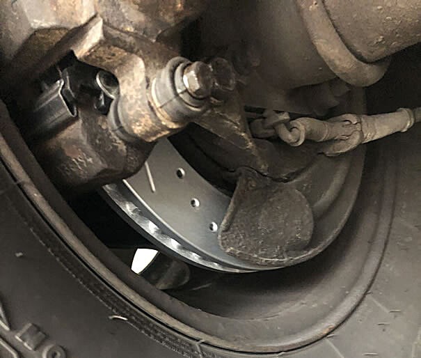 buying new brake rotors vs  resurfacing of old discs